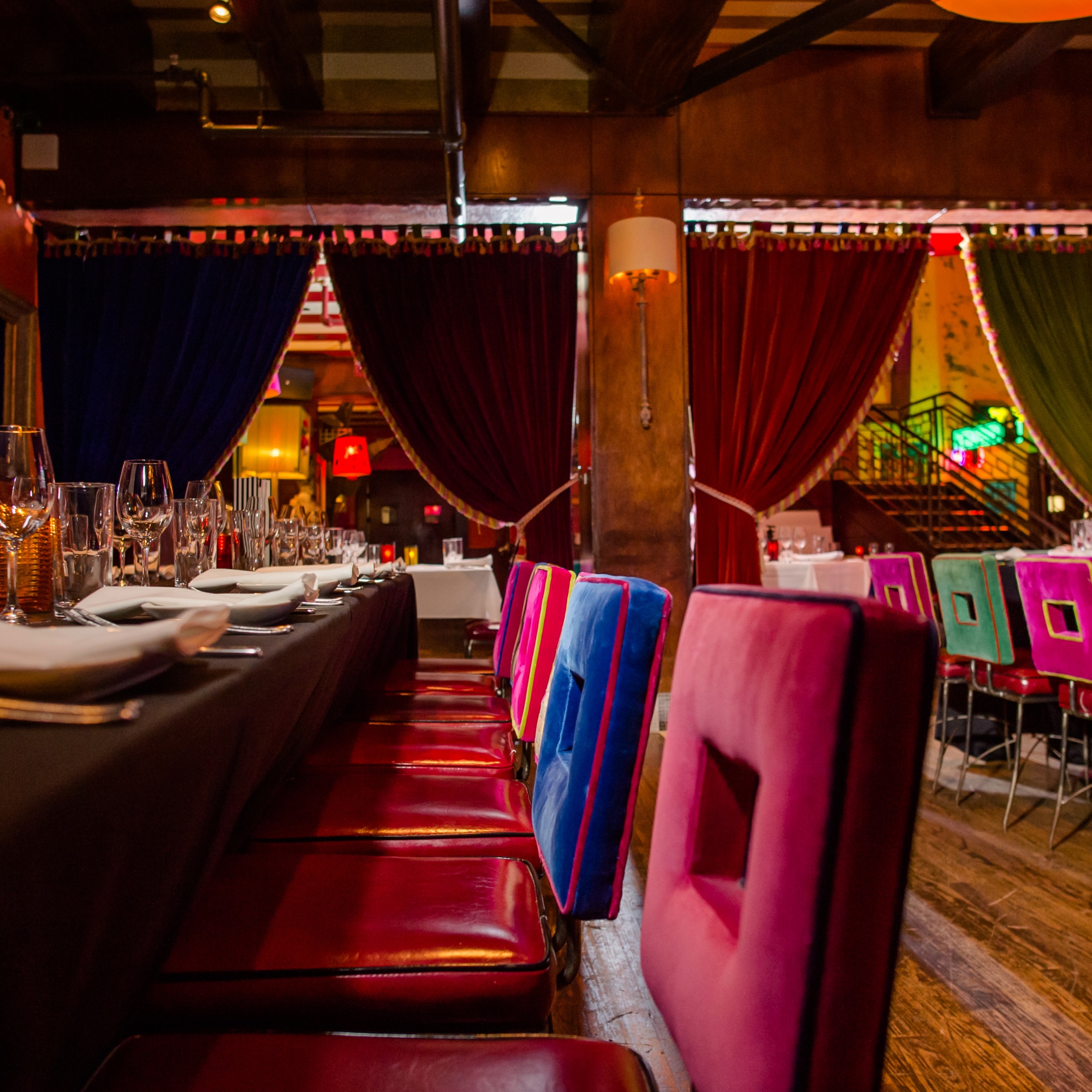 Newly married couple in front of a festive group at Carnivale