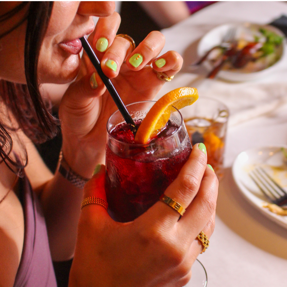 GUEST DRINKING SANGRIA