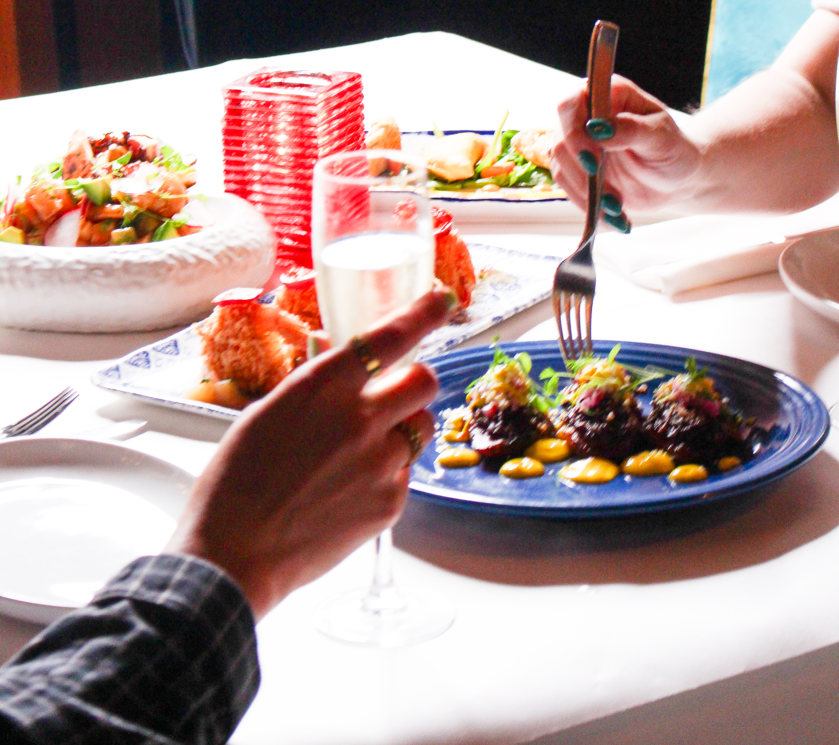 people gathering around table dining